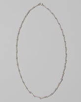 CRZM Sterling Silver Double Helix Chain Necklace on light color background.