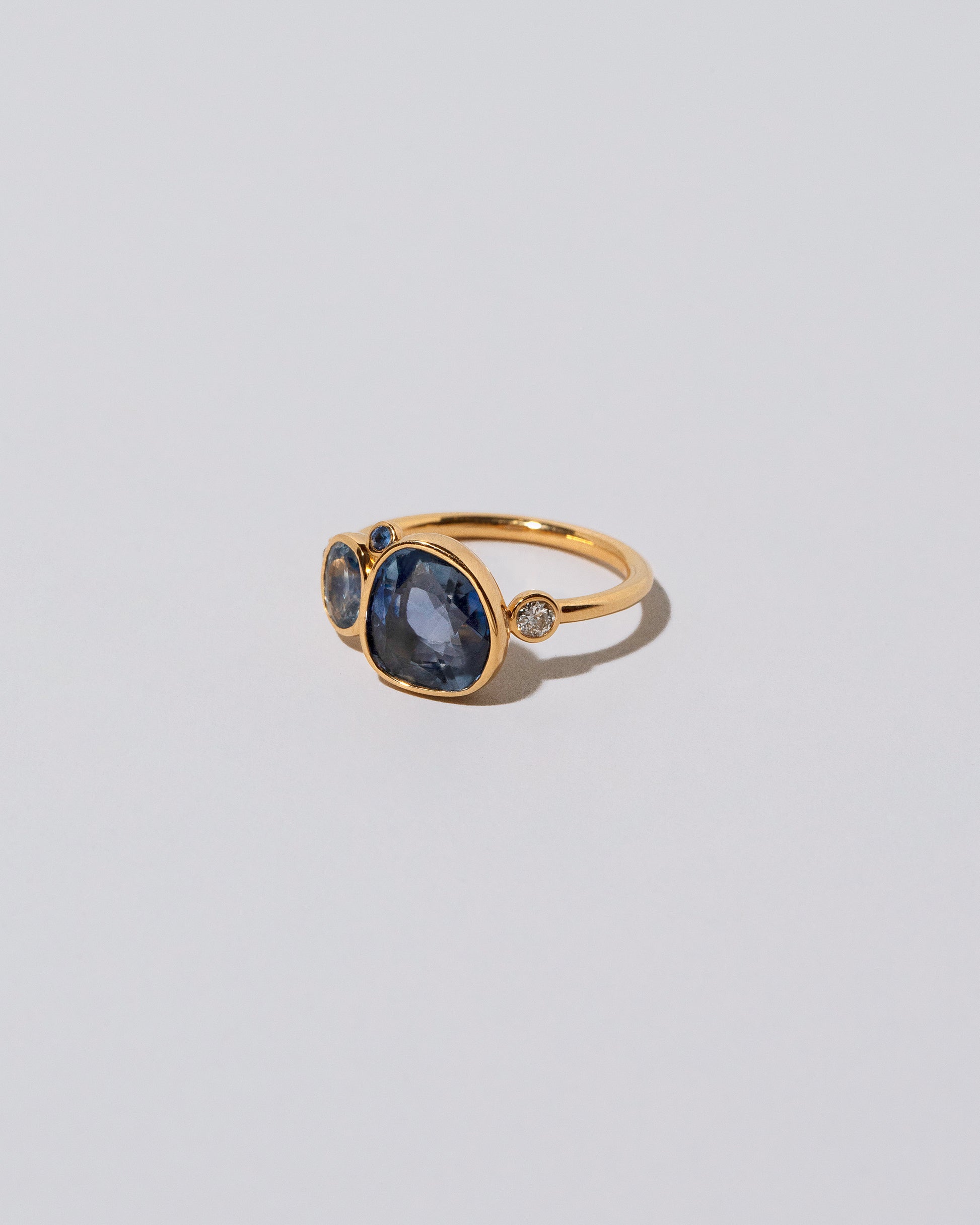 Oceania Ring on light color background.