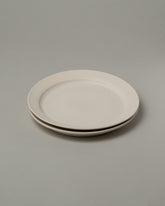 Tracie Hervy Salad Plates Set on light color background.