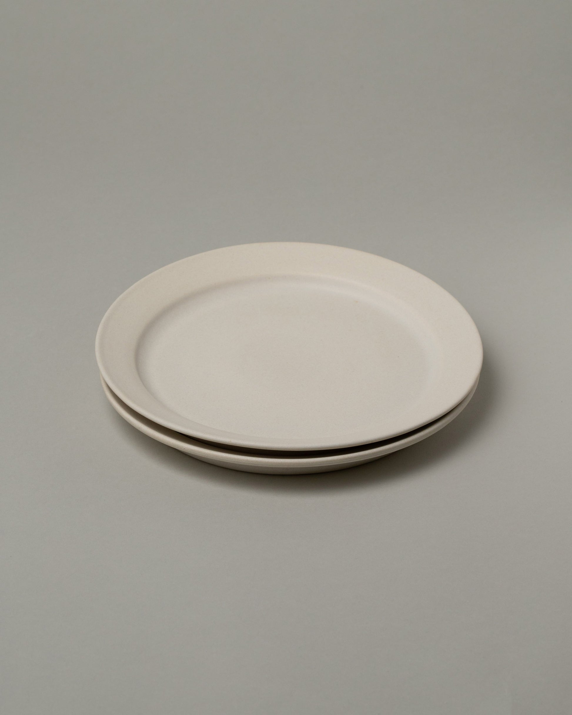 Tracie Hervy Salad Plates Set on light color background.
