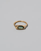 Tourmaline Equalize Ring on light color background.