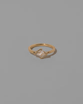 Benevolence Ring on light color background.