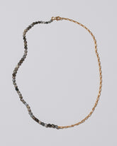 Tahitian Pearl Small Oval Necklace on light color background.