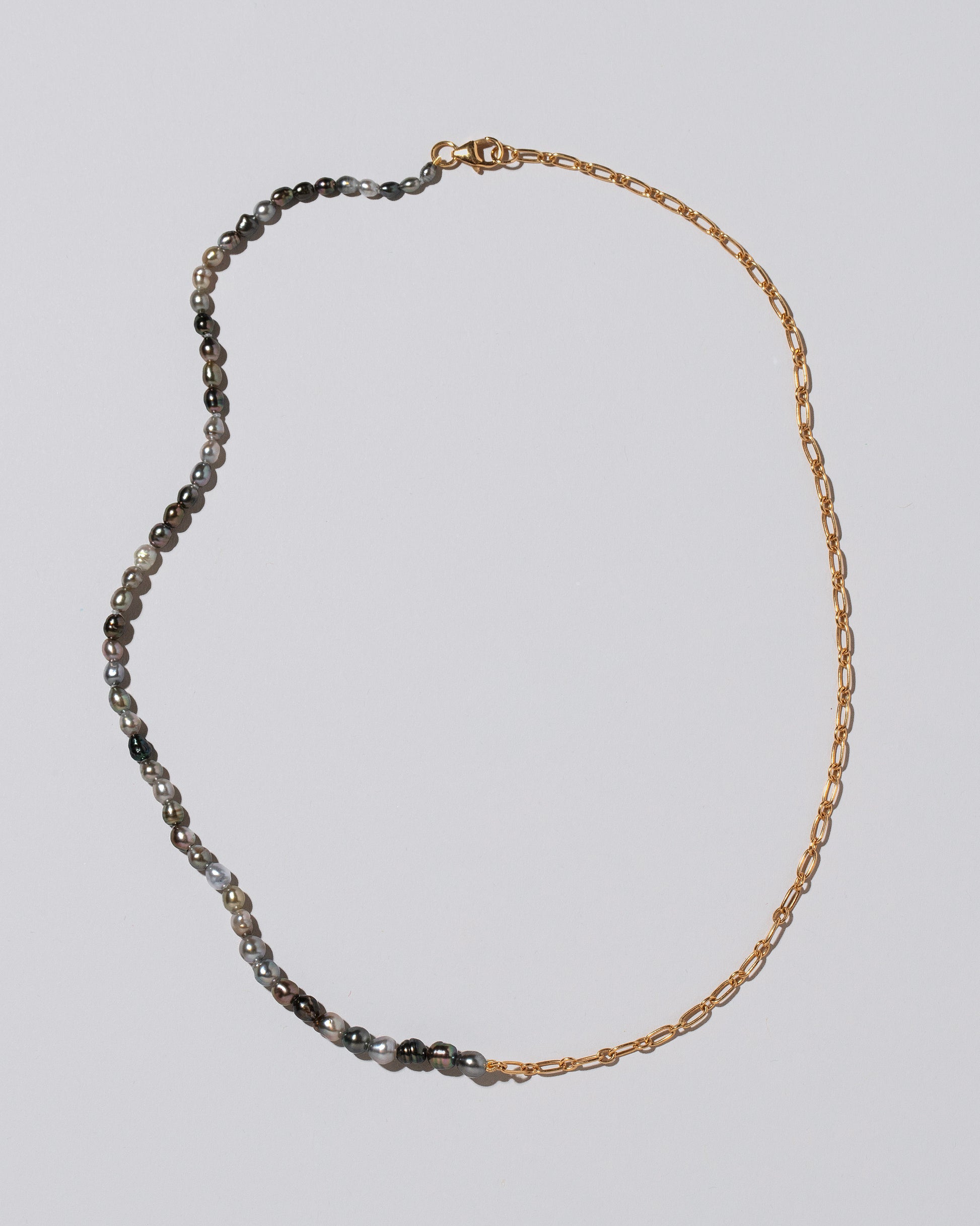Tahitian Pearl Small Oval Necklace on light color background.