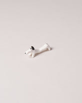 Eleonor Boström Black Chopstick Dog Rest on light color background.