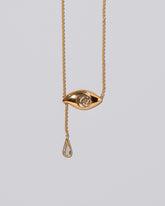 Closeup detail of the Diamond State Shifter Necklace on light color background.