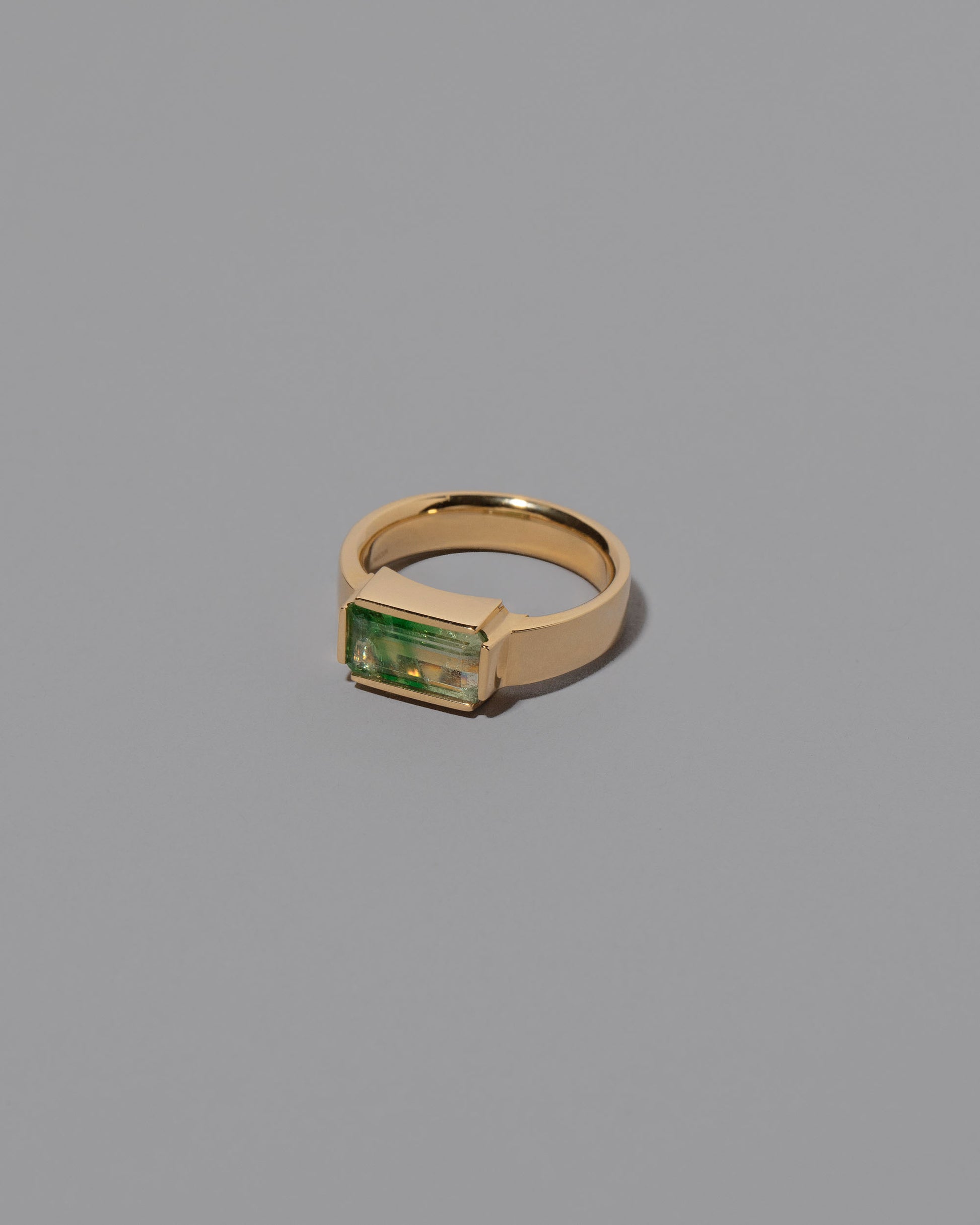 View from the side of the Gather Ring on grey color background.