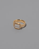 View from the side of the Envelop Ring on grey color background.