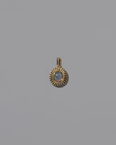 New Growth Pendant on light color background.