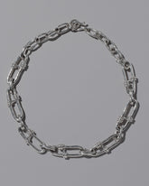 CRZM Sterling Silver Canyon Necklace on light color background.