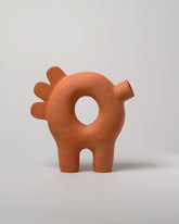 Stephanie Phillips Ferdi Sculpture on light color background.
