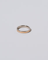 3mm Platinum Outside, Yellow 18K Inside Swimming Pool Band on light color background.