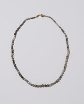 Tahitian Pearl Necklace on light color background.