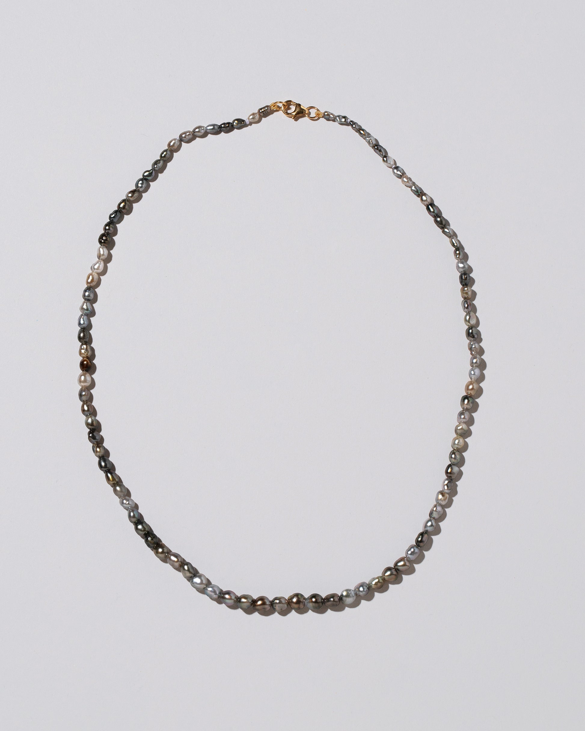 Tahitian Pearl Necklace on light color background.
