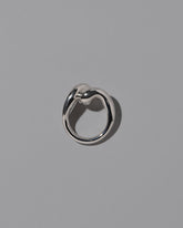 View from the side of the CRZM Sterling Silver Landform Ring on light color background.