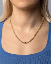 Emerald Fold Necklace on model.