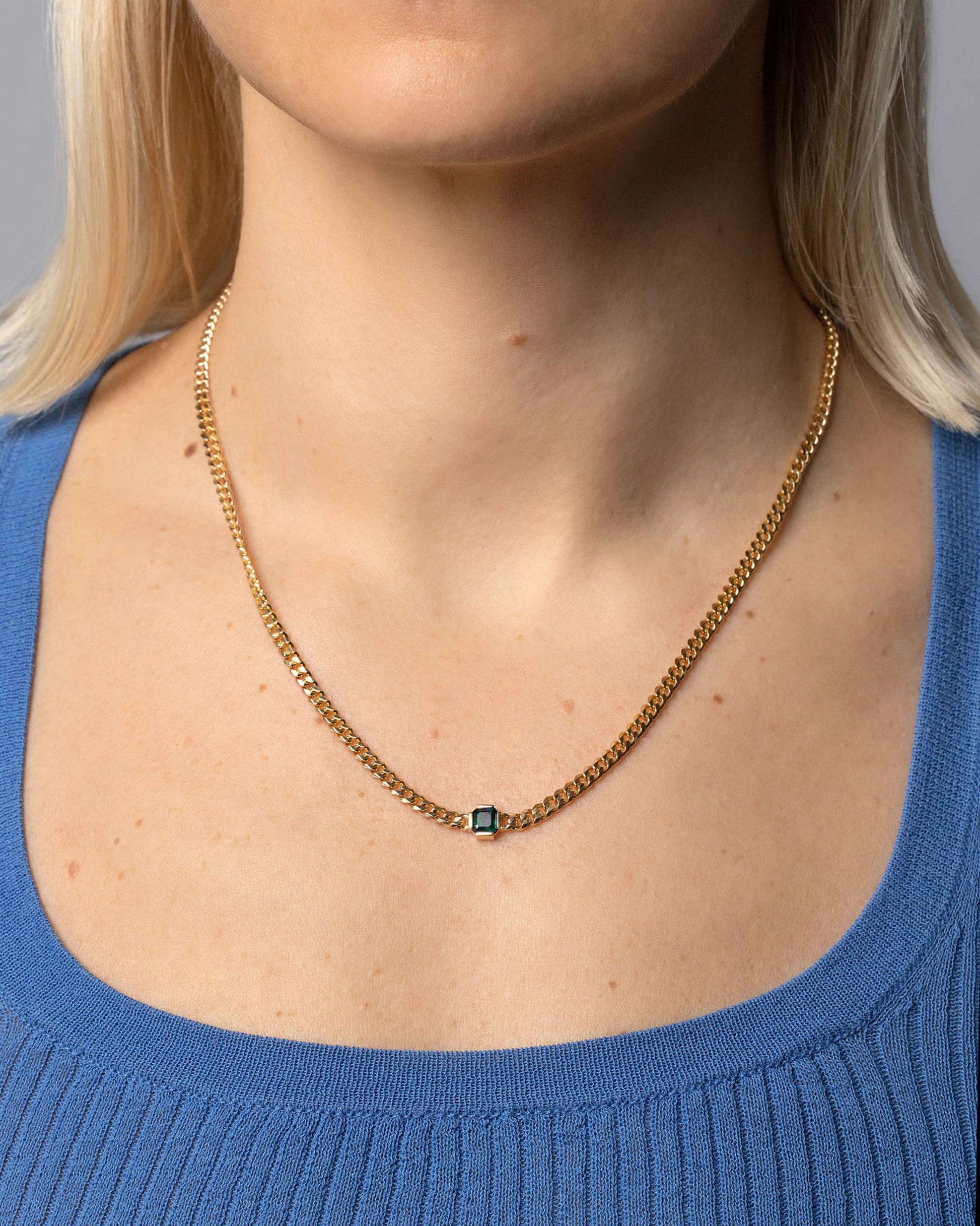Emerald Fold Necklace on model.