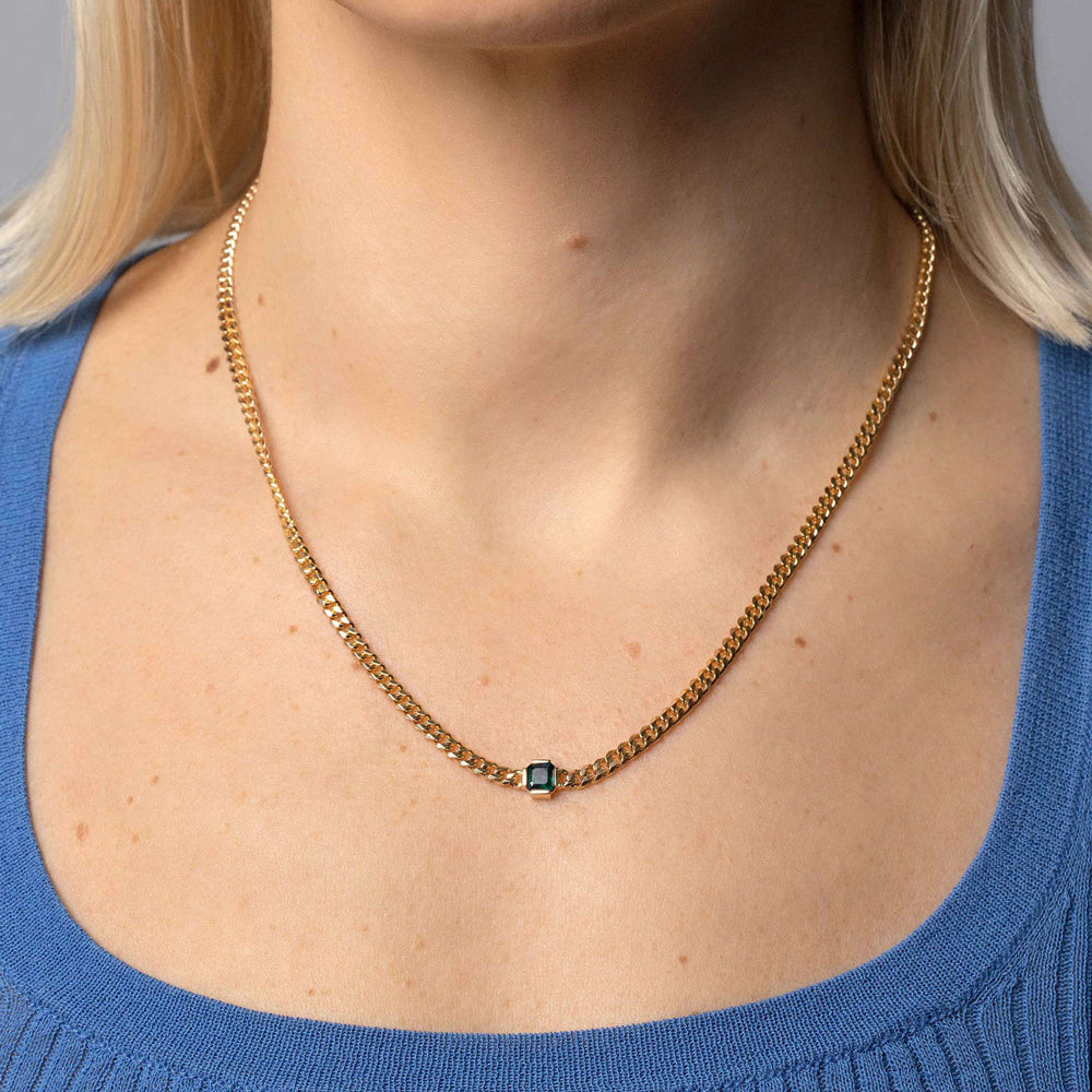 product_details::Emerald Fold Necklace on model.