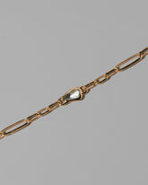 Closeup details of the Karmic Balance Bracelet on light color background.