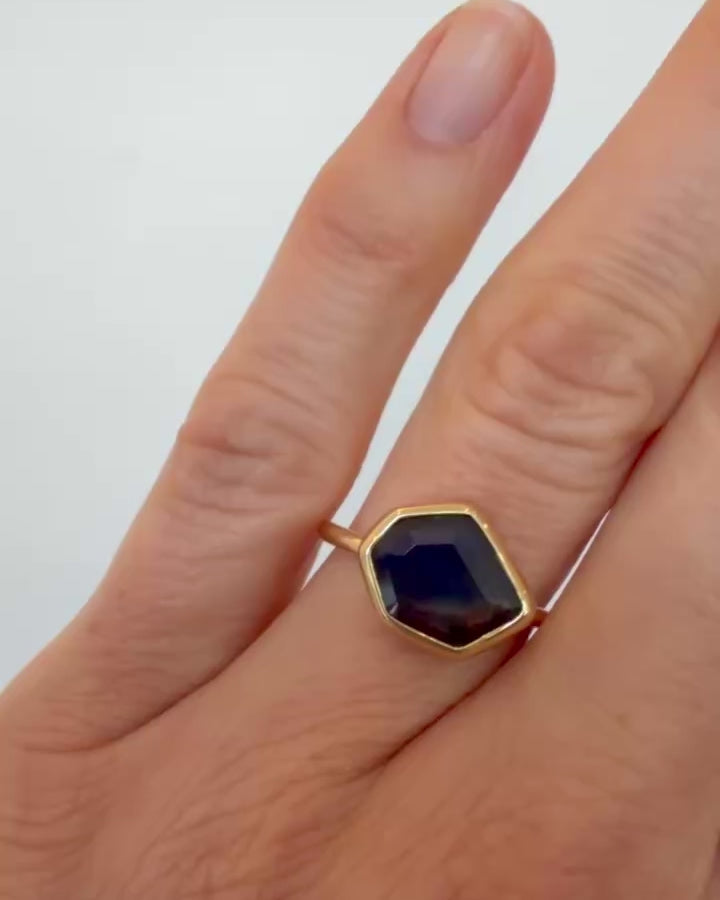 Teal Blue Sapphire Gusher Ring on model.