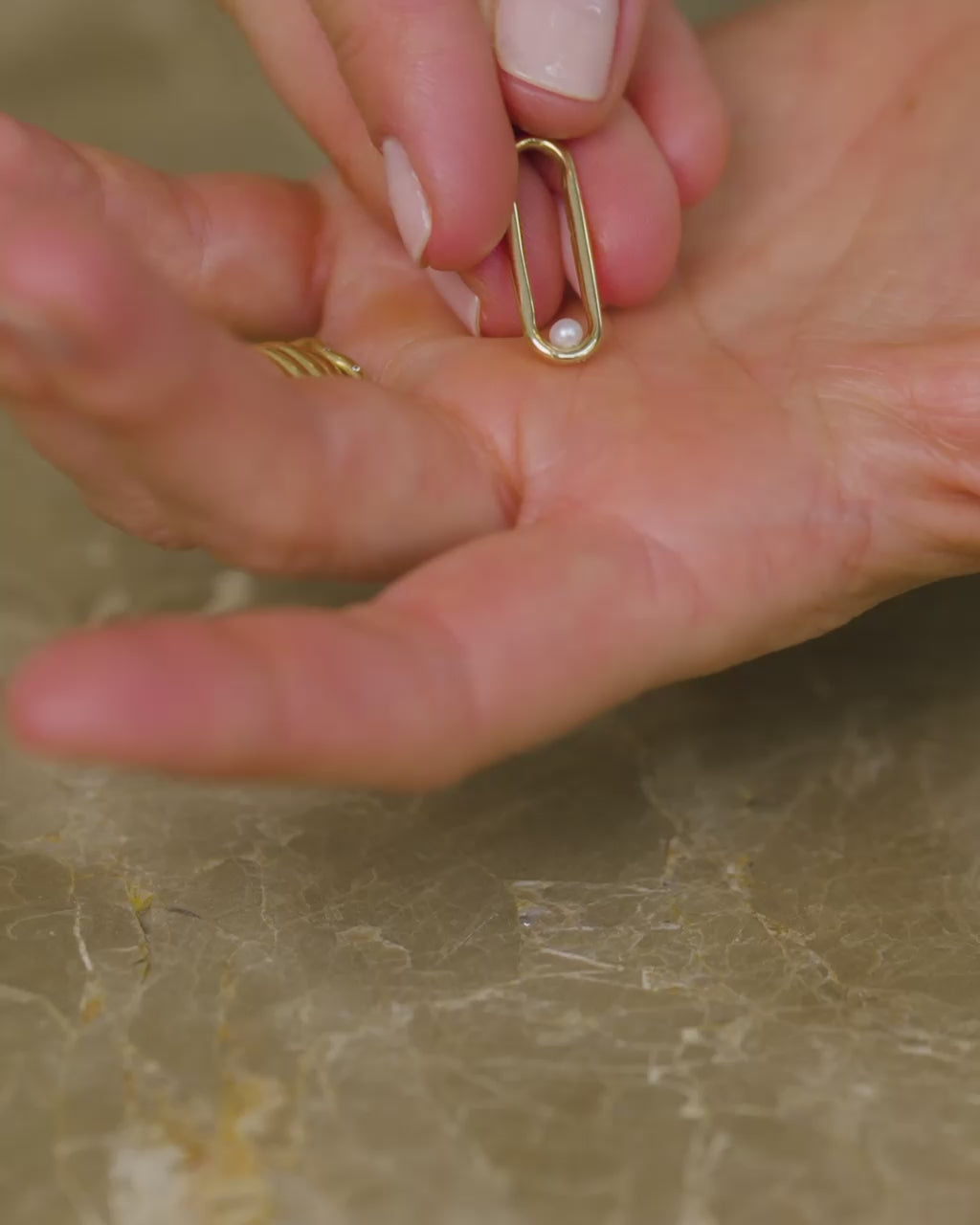 Pearl Styling Link in hand.