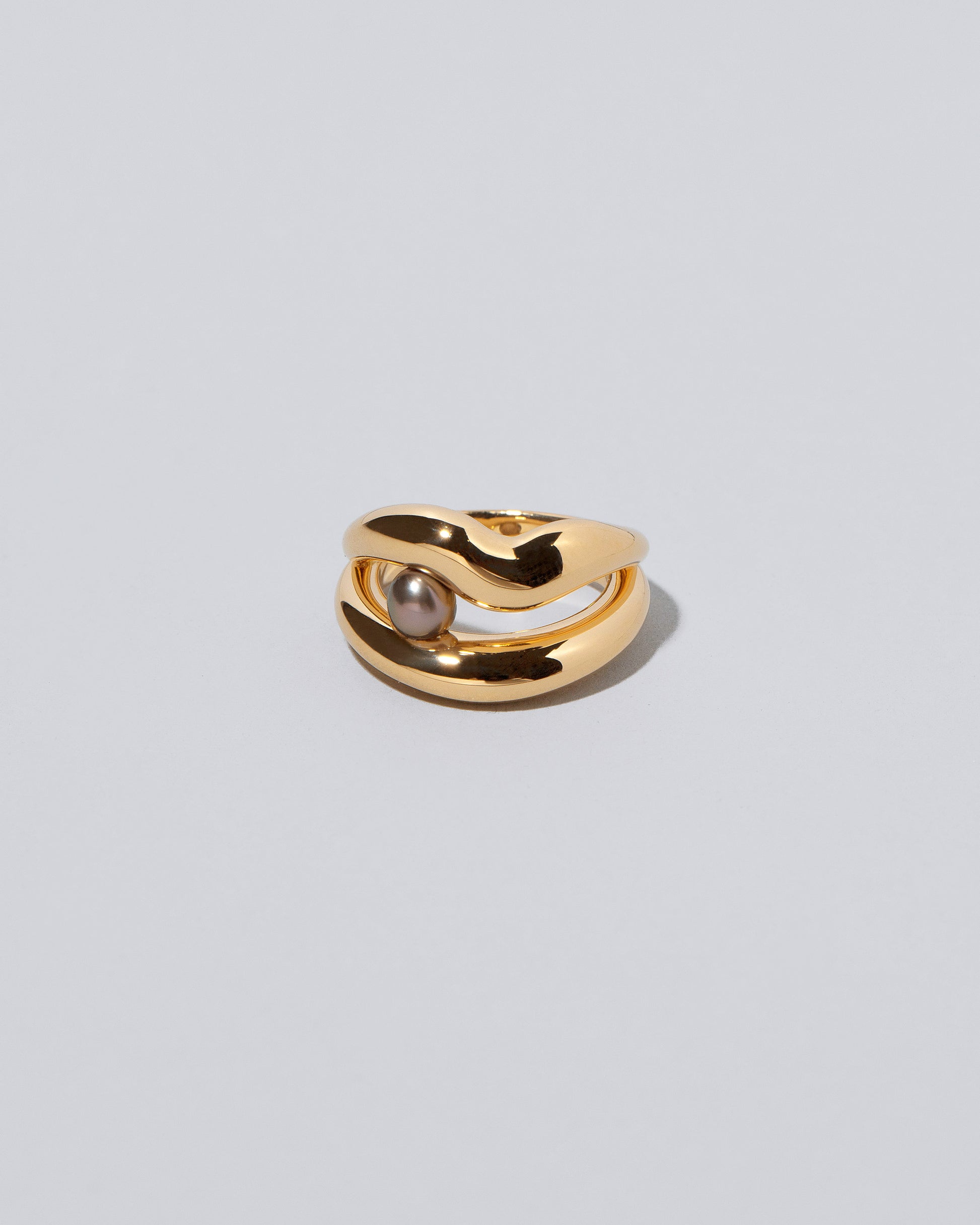 Ocean of Unity Ring on light color background.