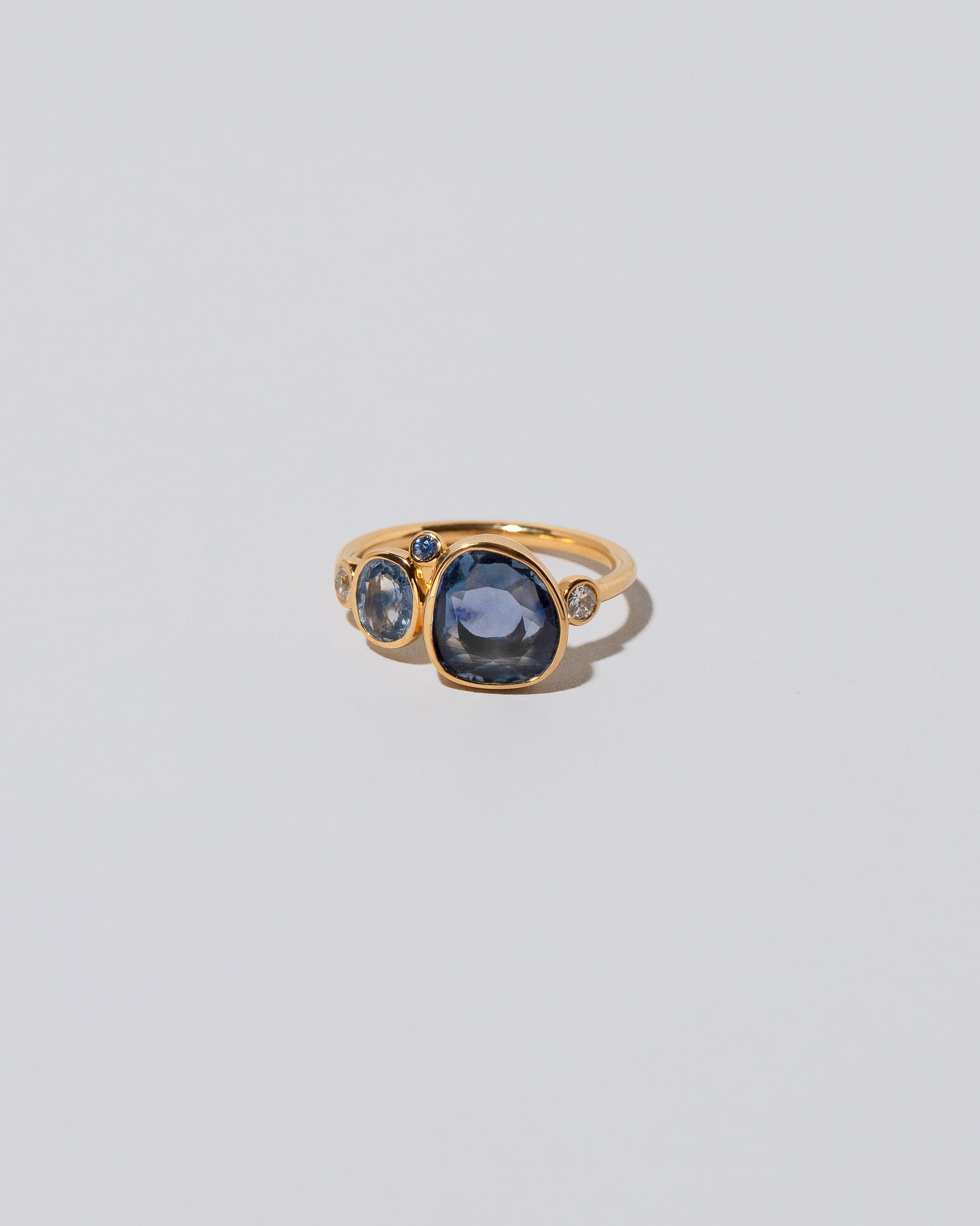 Oceania Ring on light color background.