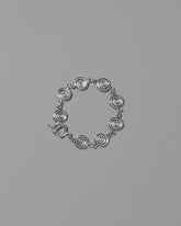 CRZM Sterling Silver Serpentinite Bracelet on light color background.