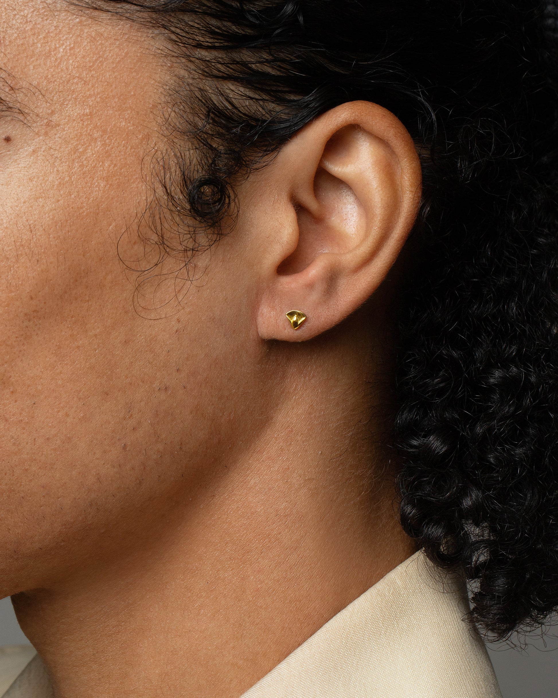 Lotus Blossom Stud Earring Single on male model.
