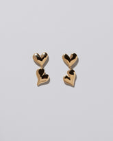 Thousand & One Night Heart Drop Earrings on light color background.