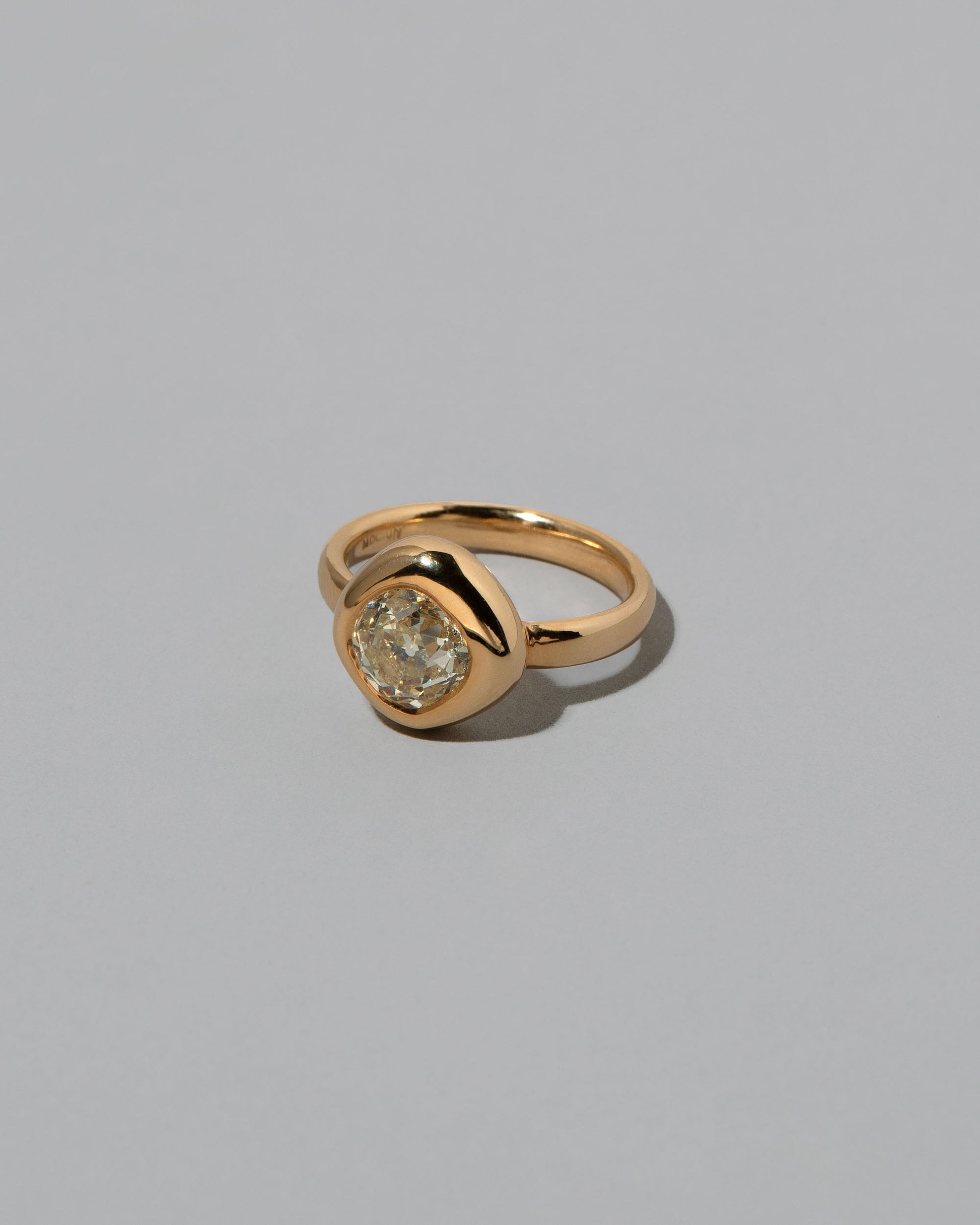 View from the side of the Balanced Ring on light color background.