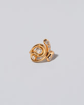 Twist It Ring on light color background.