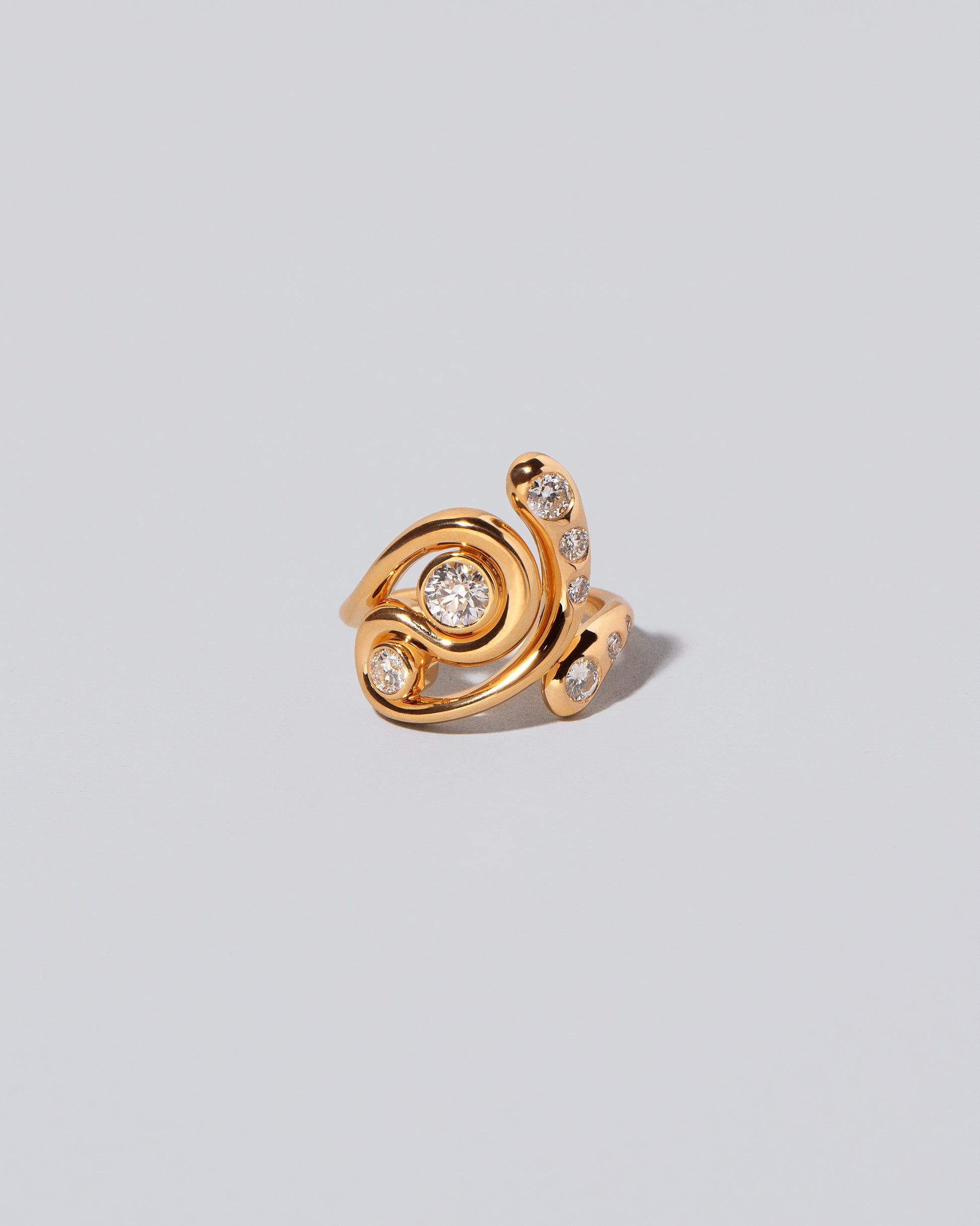 Twist It Ring on light color background.