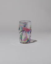 Sirius Glassworks Iridescent Nassau Tumbler on light color background.