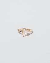  High & Low Ring on light color background.