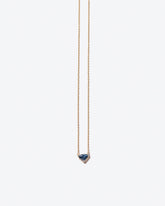 Product photo of Gil Necklace on a light color background 