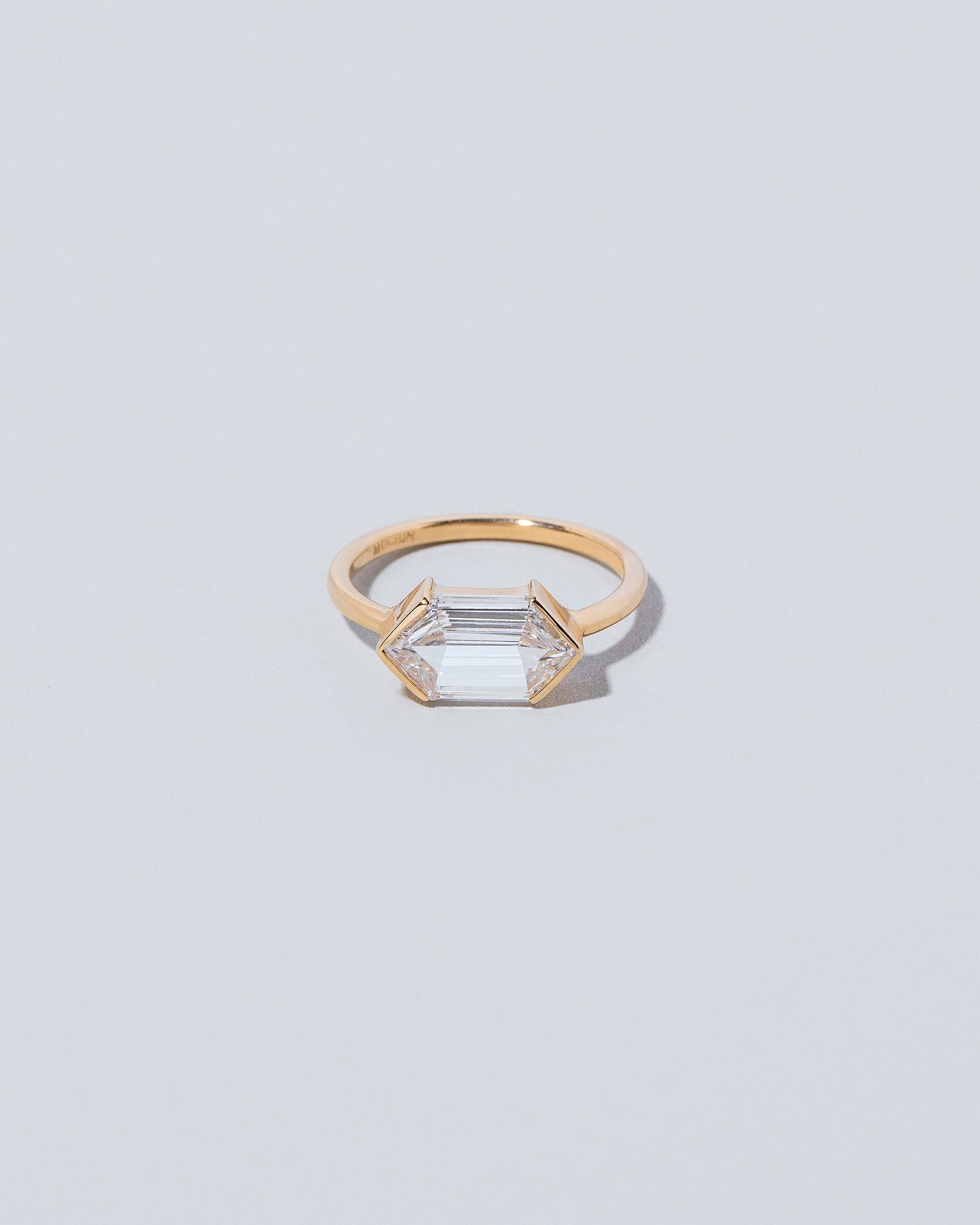 Headstrong Ring on light color background.