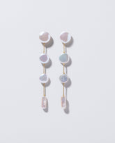  Antaeus Earrings on light color background.