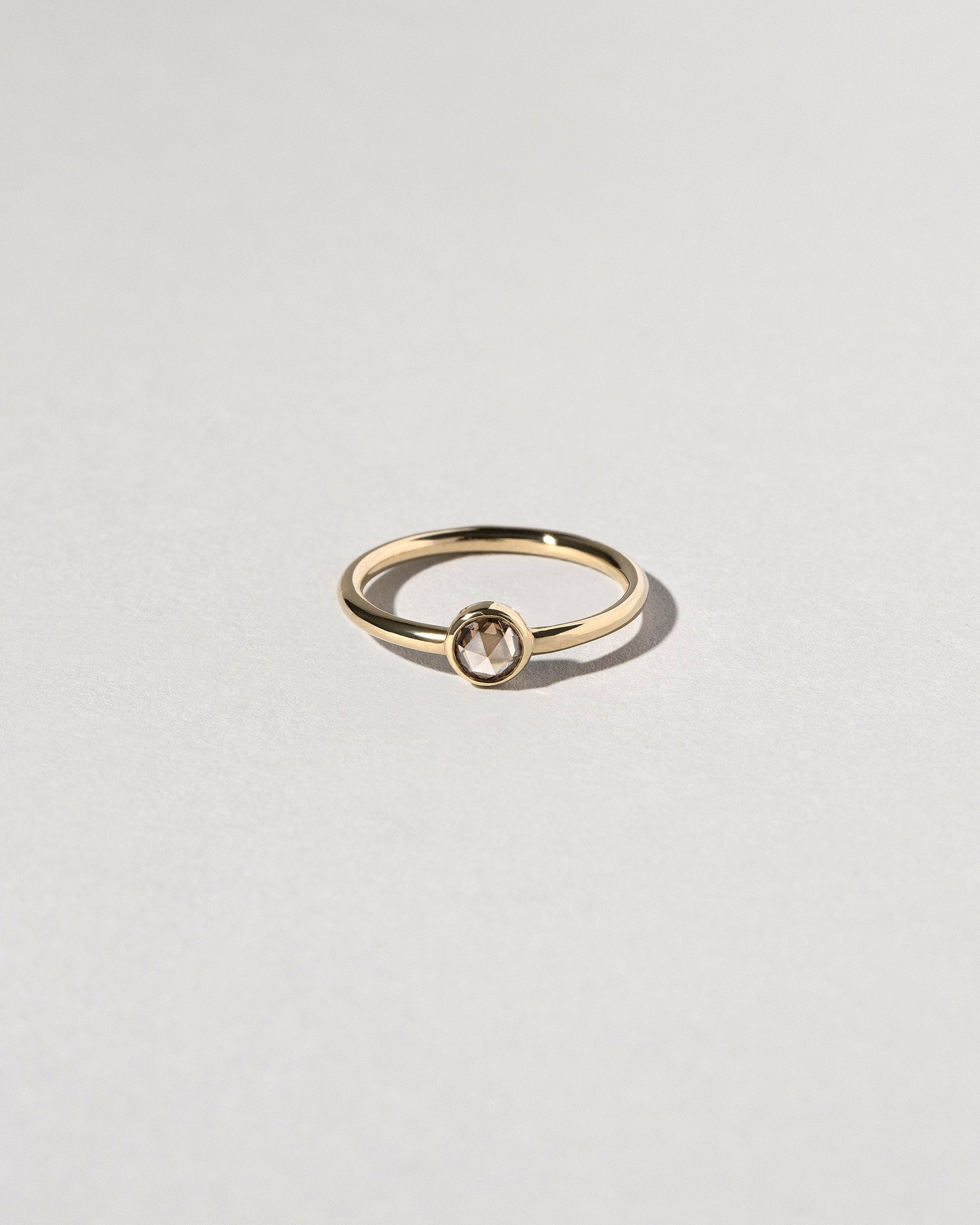 Rose Cut Champagne Diamond Ring on light color background.