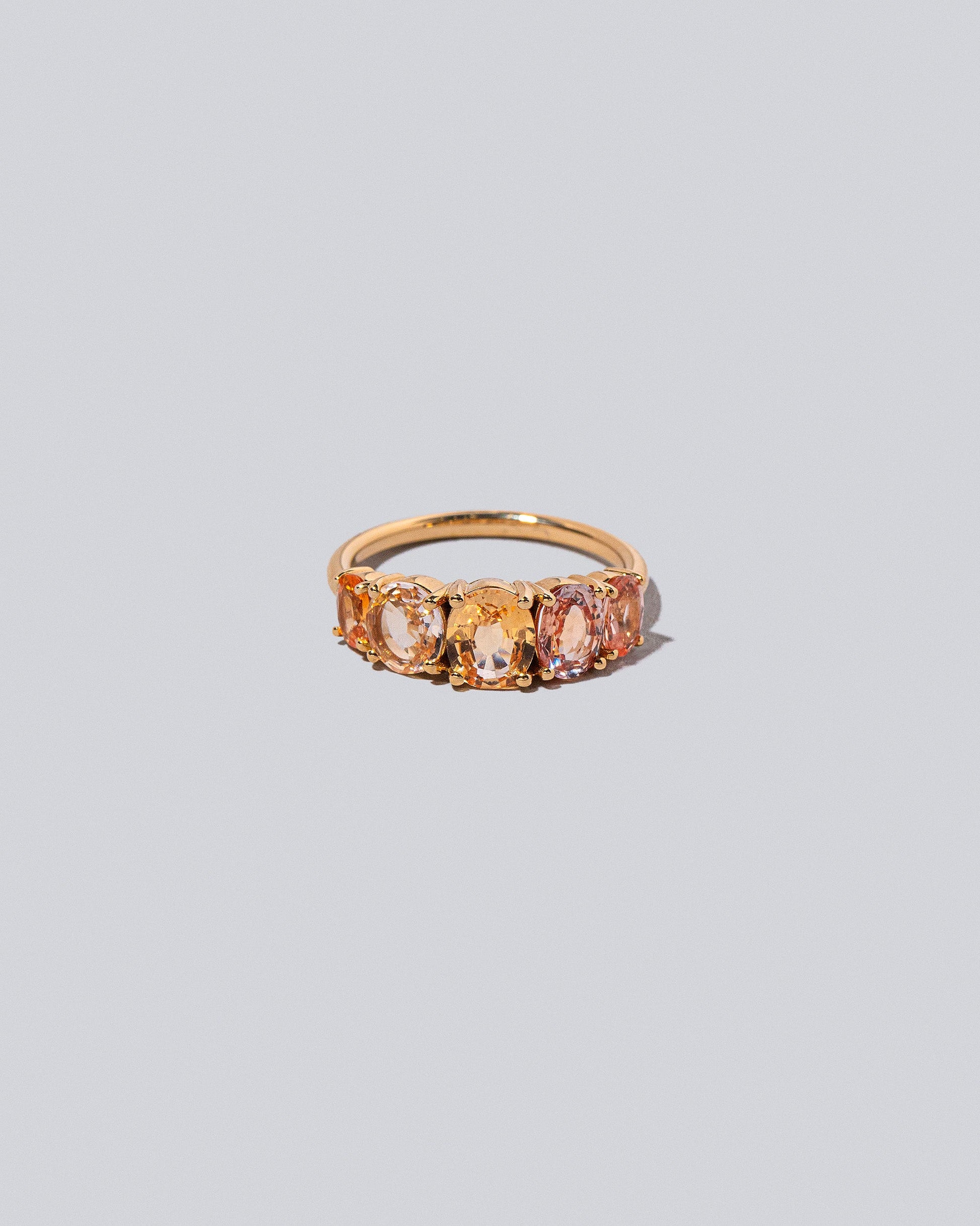 Doubles Ring on light color background.