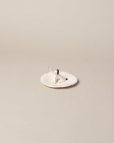 Eleonor Boström Dog Ring Dish on light color background.