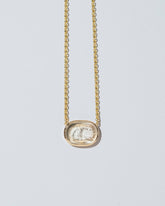  Simplicity Intaglio Seal Necklace on light color background.