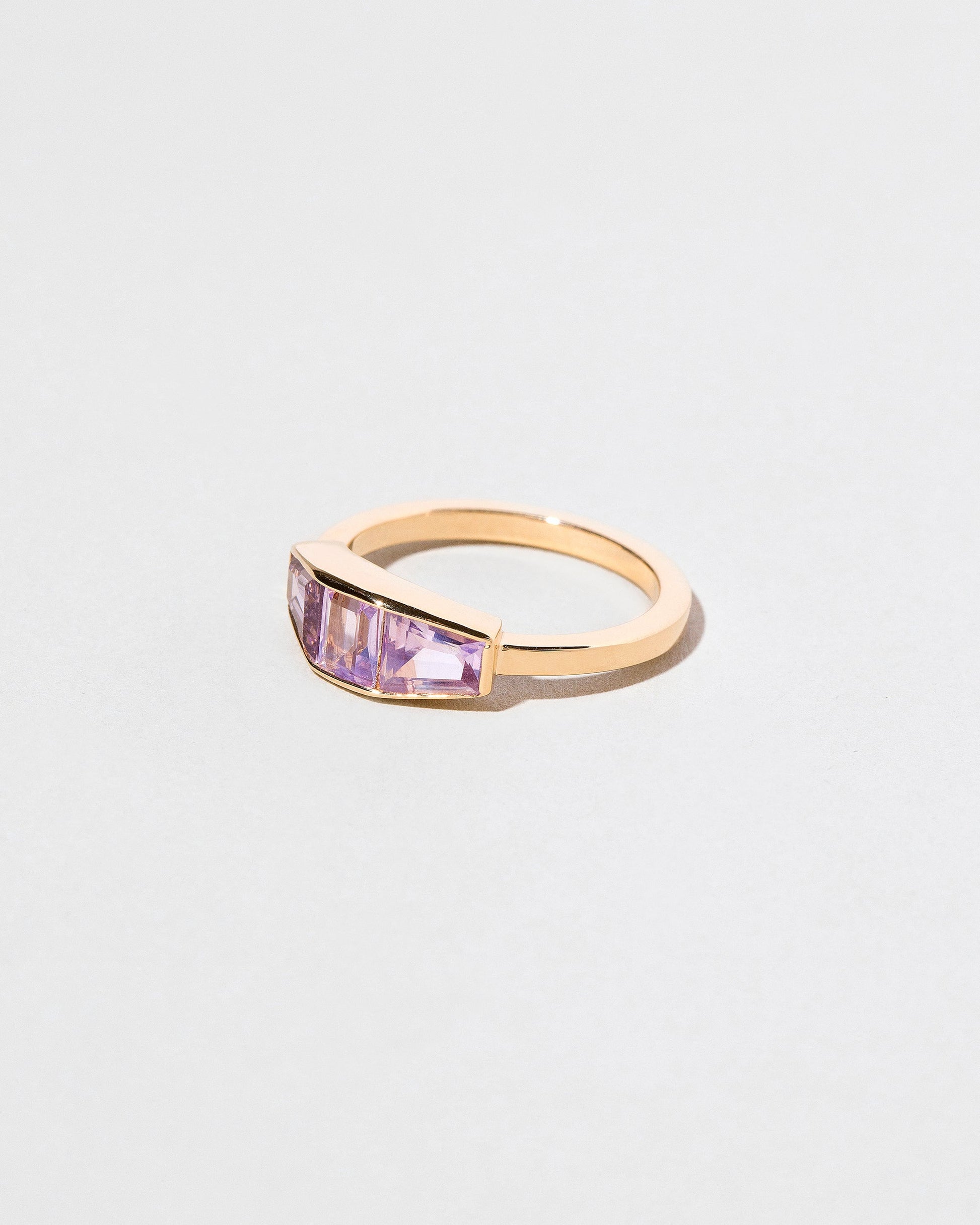  Dhatu Ring on light color background.