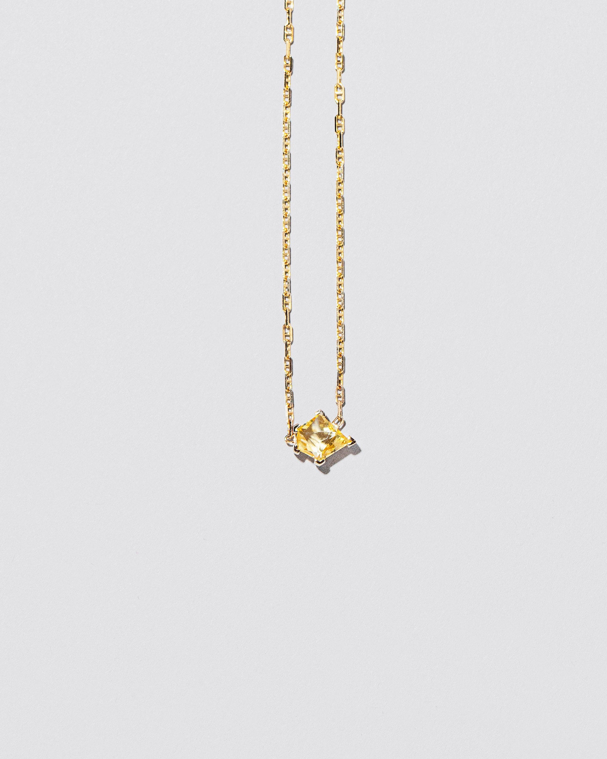  Be Good Necklace on light color background.