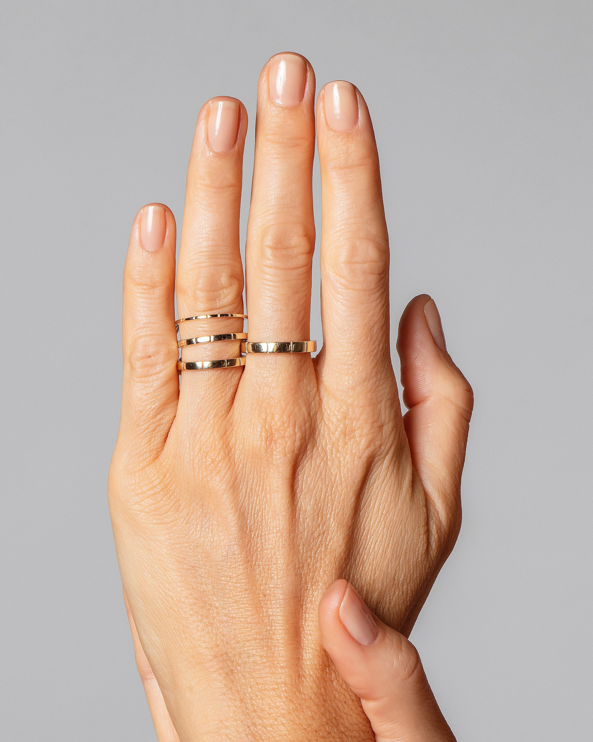 Gold Etched Lines Bands on model.