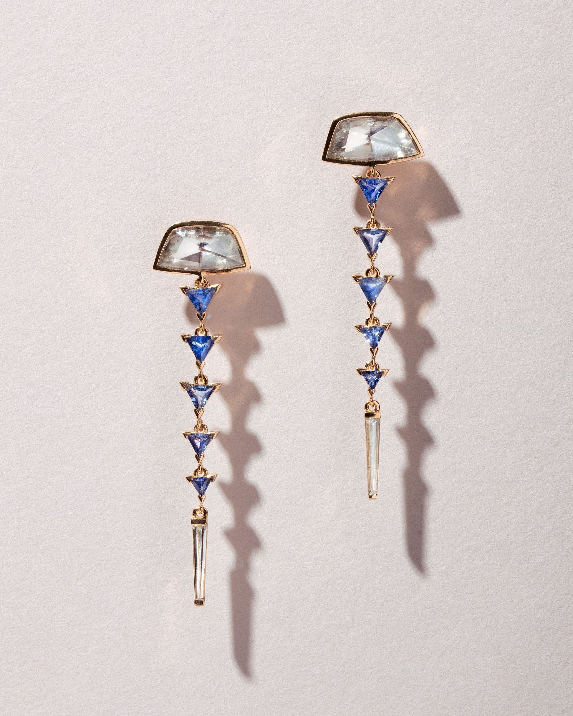  Abundance Earrings on light color background.
