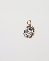  Poppy Seed Bagel Charm with Cream Cheese on light color background.