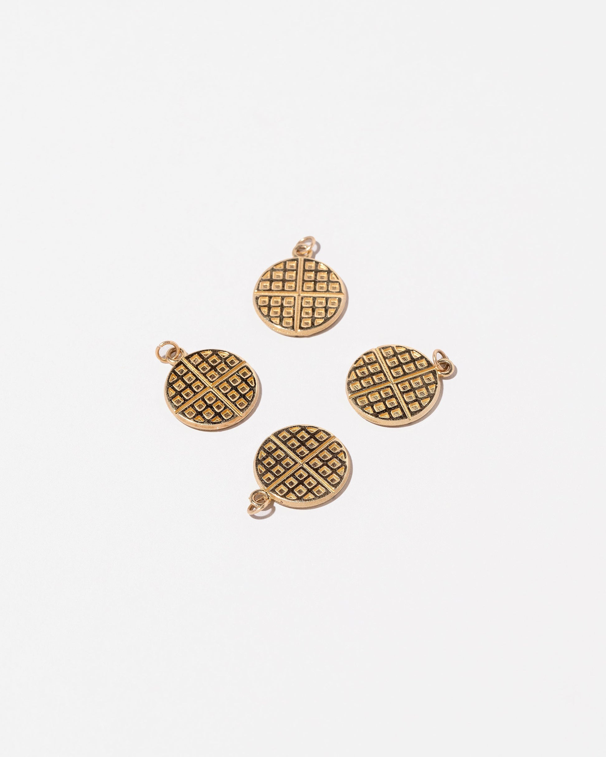 Waffle Charms on light color background.