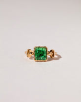  Emerald Moon Ring on light color background.