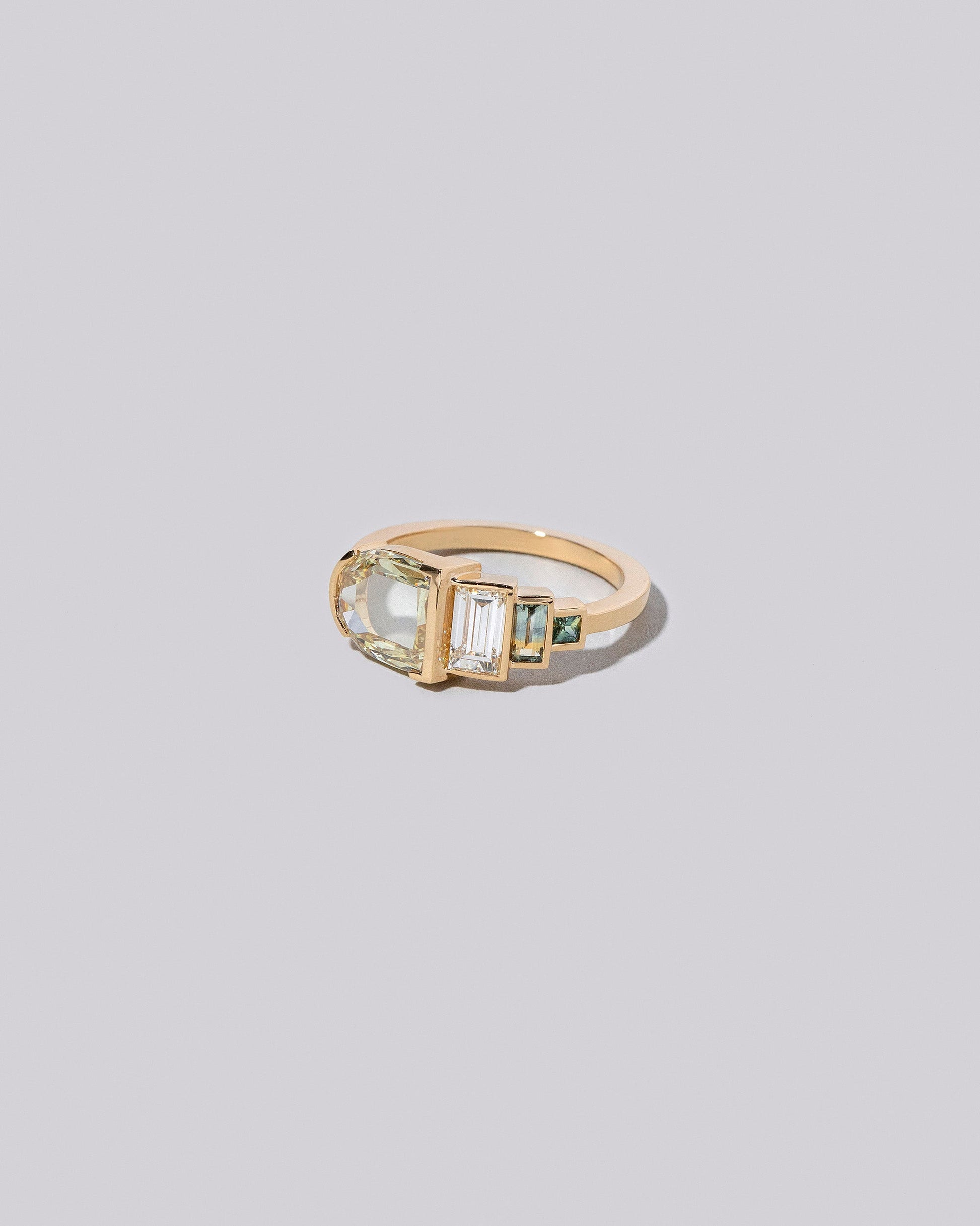 Albertine Ring on light colored background.